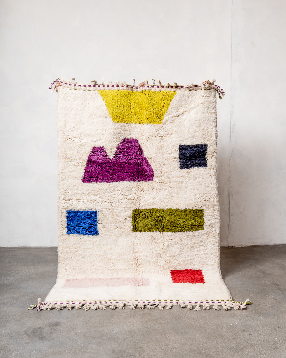 Modern, designer, handcrafted Berber rug from Morocco. Beniourain carpet with beautiful colours and patterns and fluffy wool texture.